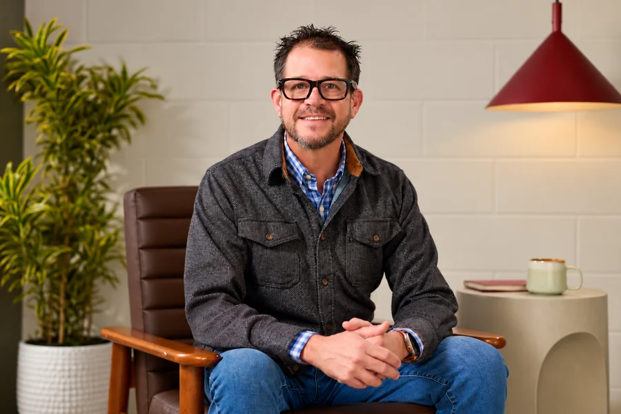 Randall Stone in a warm office setting