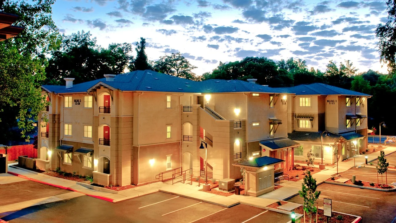 Bidwell Park Apartments exterior at dusk